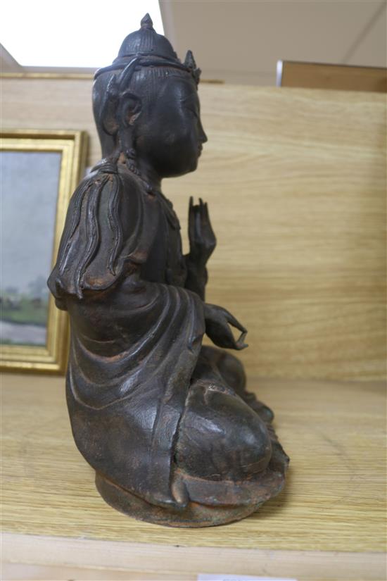 A bronze figure of Guanyin 12in.